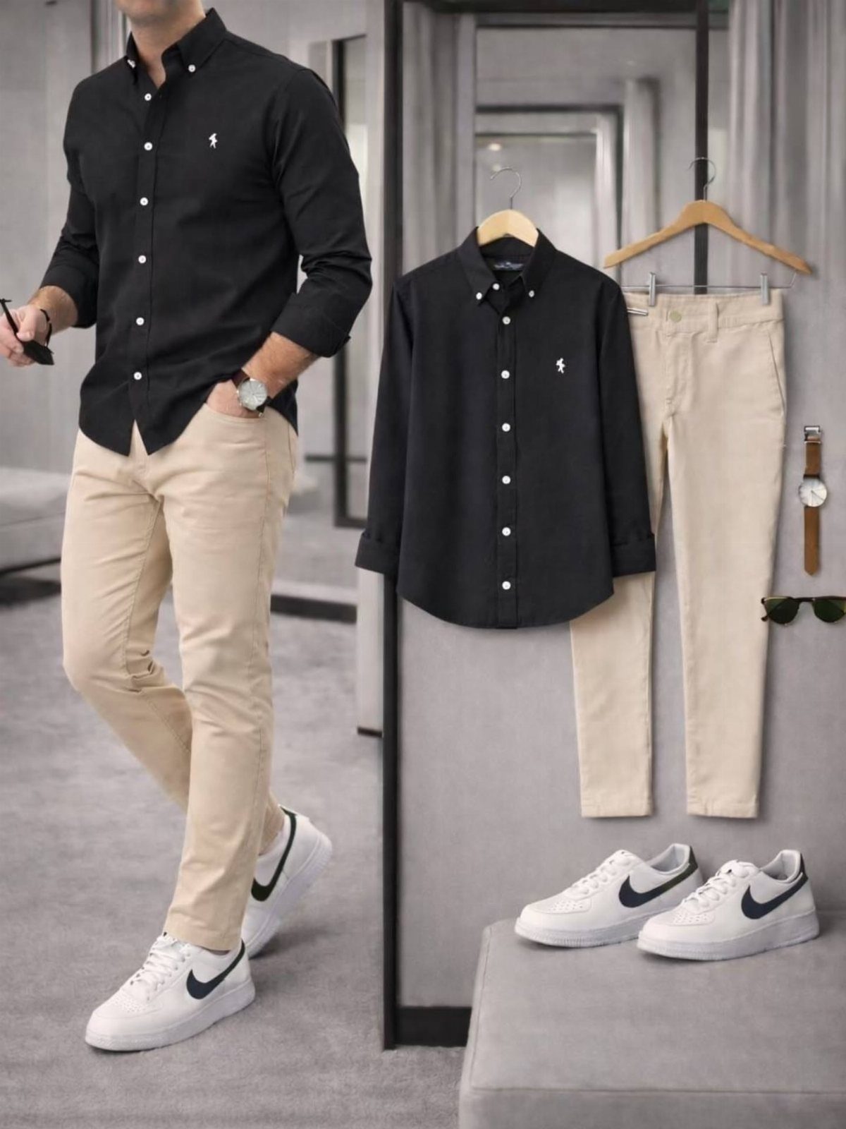 A man wearing a black shirt and beige trousers paired with white sneakers.